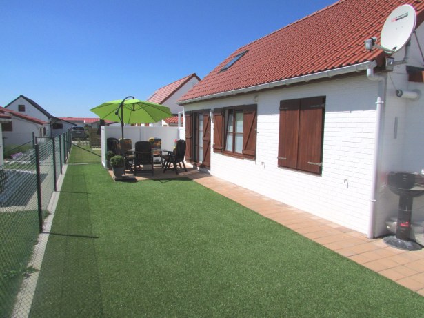 Eigen foto van het terras en de tuin bij de woning